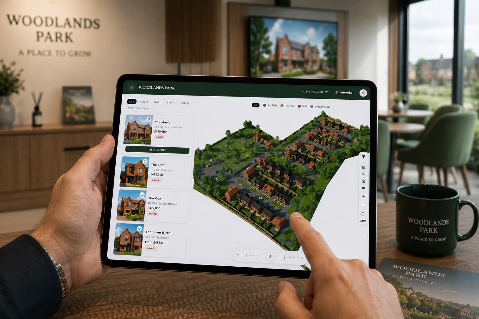 An iPad held at the sales desk showing the same interactive siteplan
